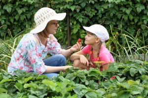 Mother and daughter gardening together